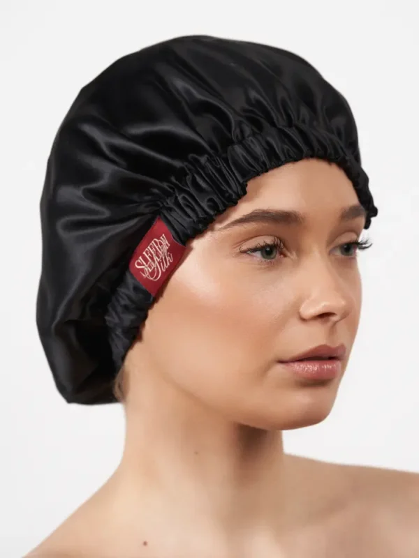 woman with black sleep bonnet